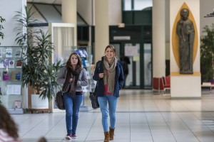 two girls in a university hall