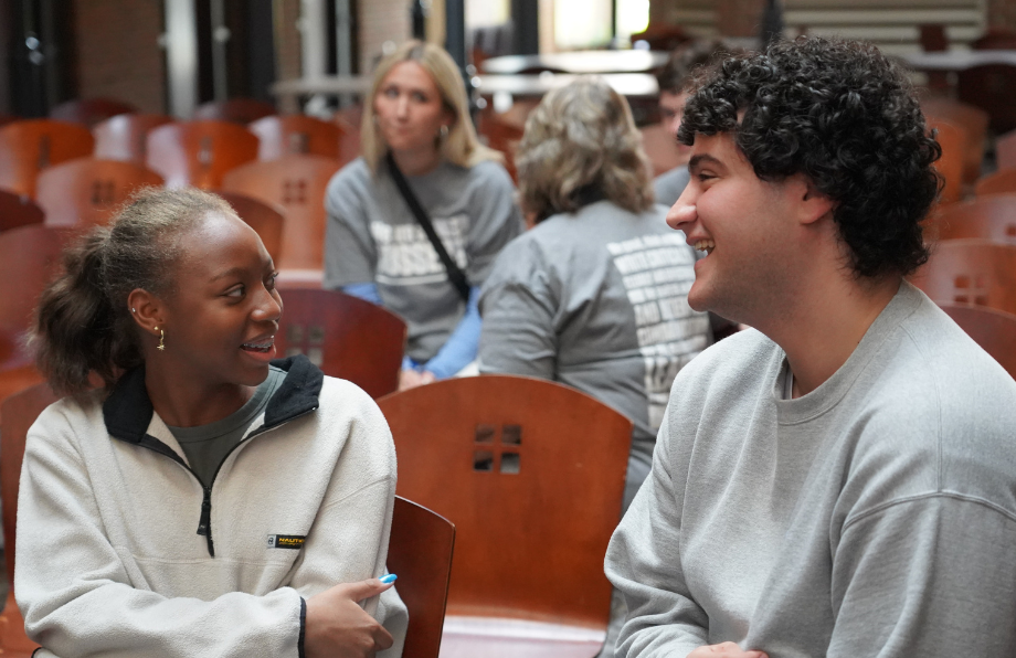 two jcu students talking and smiling
