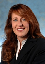 head shot of red headed woman