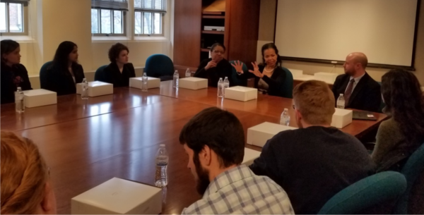 Students at a lunch roundtable with Ambassador Gina Abercrombie-Winstanley.