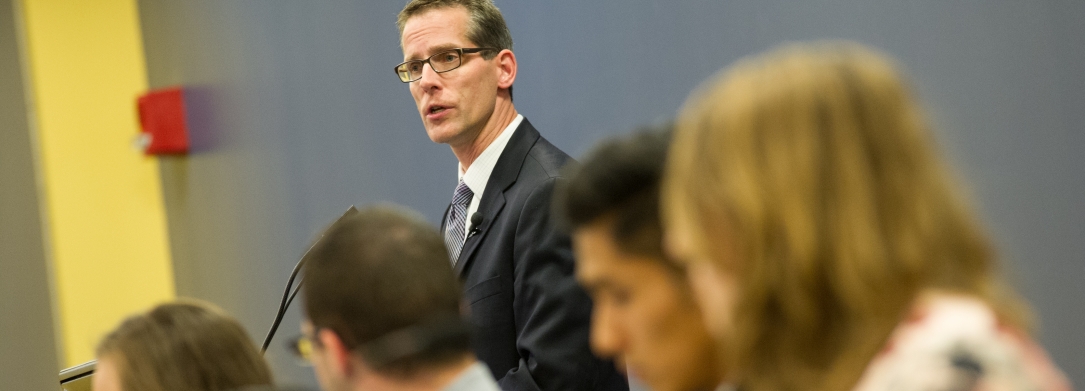 Professor Edward Hahnenberg, Ph.D., leading a panel discussion