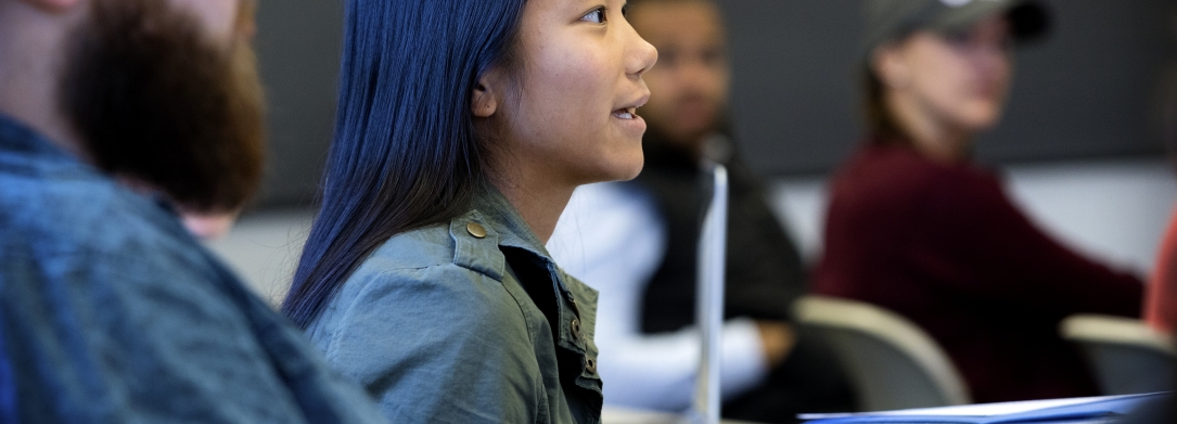 dark haired girl in classroom