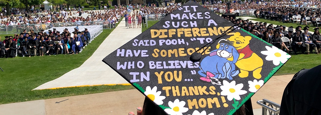Decorated graduation cap featuring Winnie the Pooh and Eeyore that reads, "It makes such a difference," said Pooh, "to have someone who believes in you ..." Thanks, Mom! 