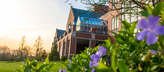 dolan science center and spring flowers on campus